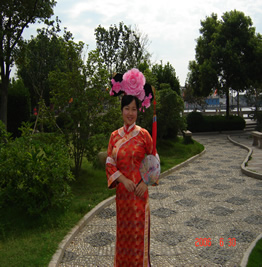 Chinese girl in silk dress (Zhouzhuang, China)